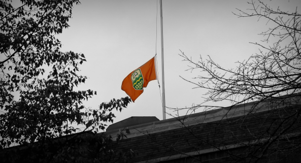 Lowering the flag to half-mast