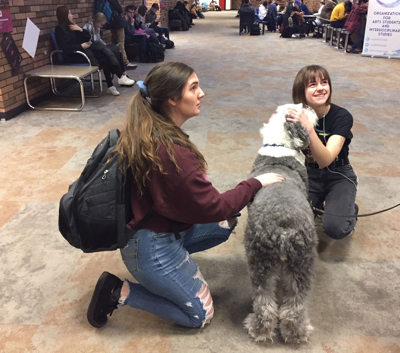 students with dog from CAAWLS